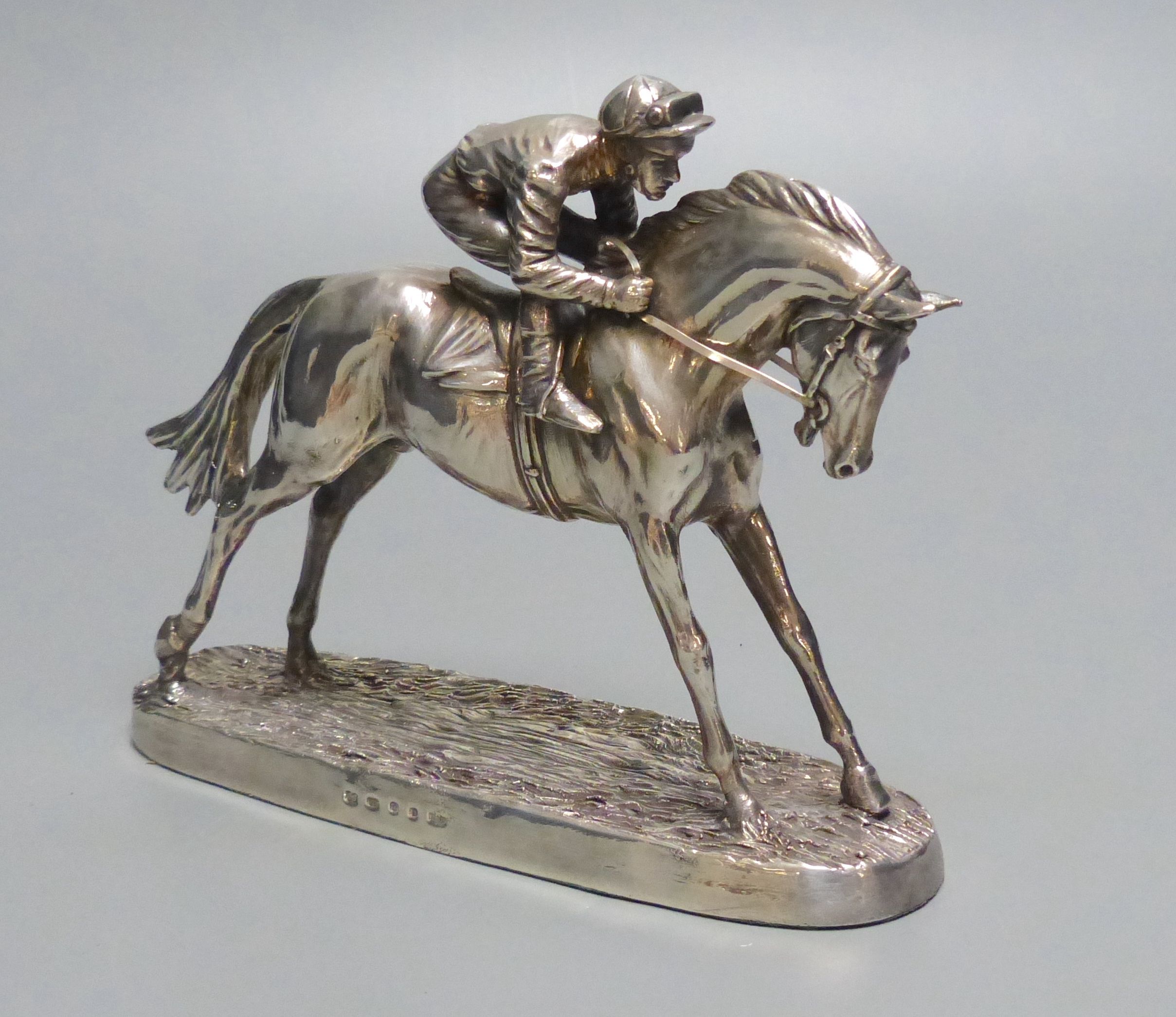 A modern silver mounted model of a racehorse and jockey, after R. Donaldson